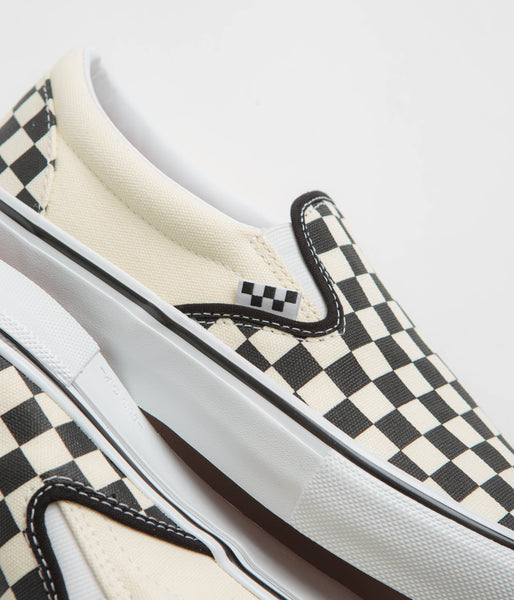 Black and grey checkered slip on vans hotsell