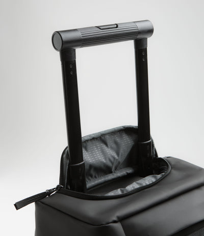 D_b_ Hugger 40L Carry-On Roller Bag - Black Out