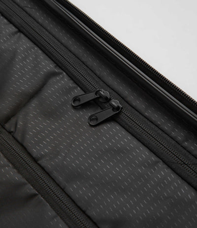 D_b_ Ramverk Large Check-In Luggage - Black Out