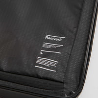 D_b_ Ramverk Large Check-In Luggage - Black Out thumbnail