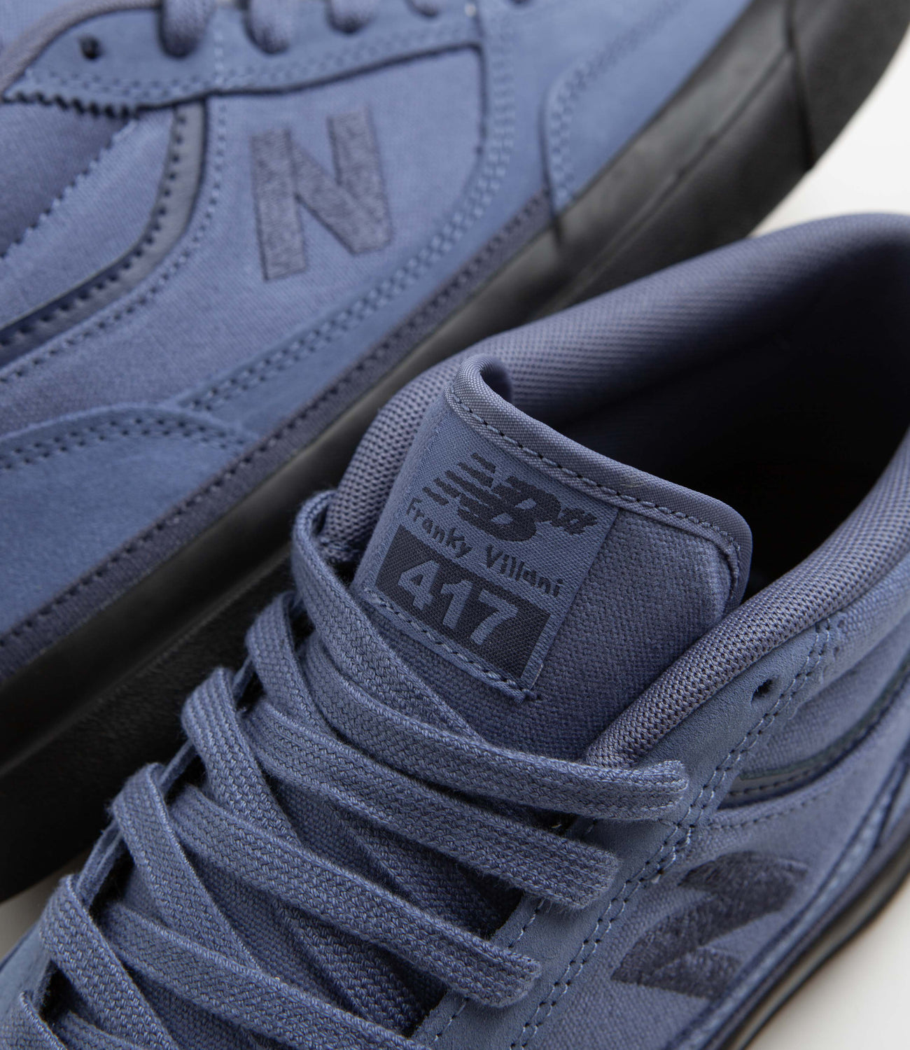 New balance blue and hot sale black