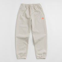 Nike ACG Tuff Fleece Lungs Pants - Light Orewood Brown / Hyper Crimson thumbnail