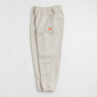 Nike ACG Tuff Fleece Lungs Pants - Light Orewood Brown / Hyper Crimson thumbnail