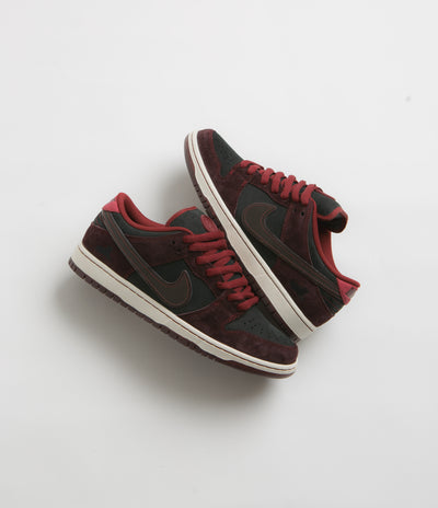 Nike SB x RIOT Skateshop Dunk Low Pro Shoes - Mahogany / Dark Beetrot - Team Red - Sail