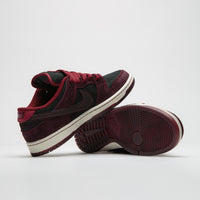 Nike SB x RIOT Skateshop Dunk Low Pro Shoes - Mahogany / Dark Beetrot - Team Red - Sail thumbnail