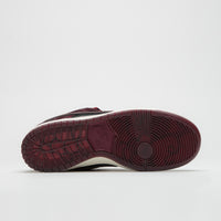 Nike SB x RIOT Skateshop Dunk Low Pro Shoes - Mahogany / Dark Beetrot - Team Red - Sail thumbnail