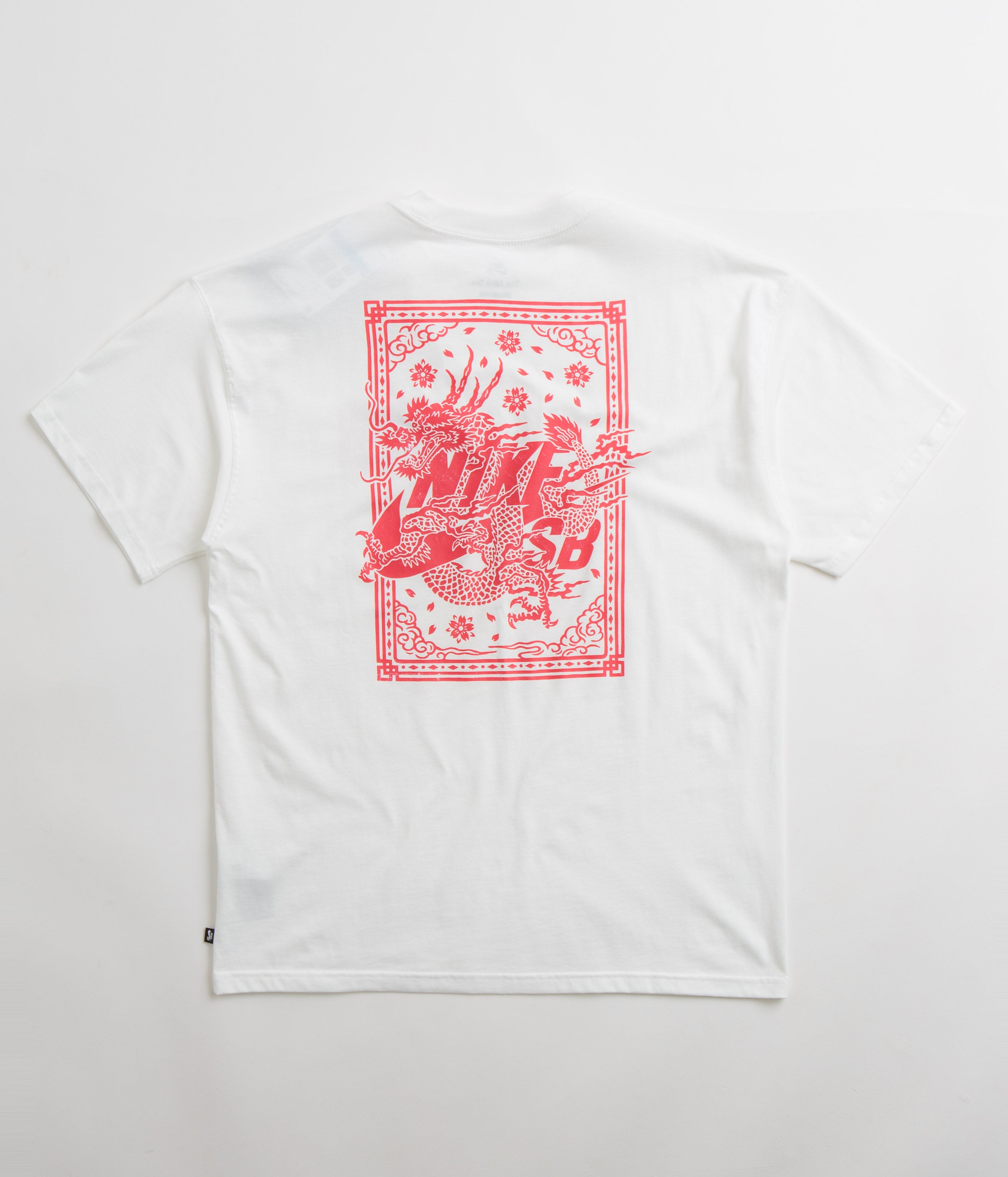 White nike shirt hot sale with pink check