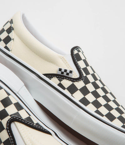 Black and white check slip on vans best sale