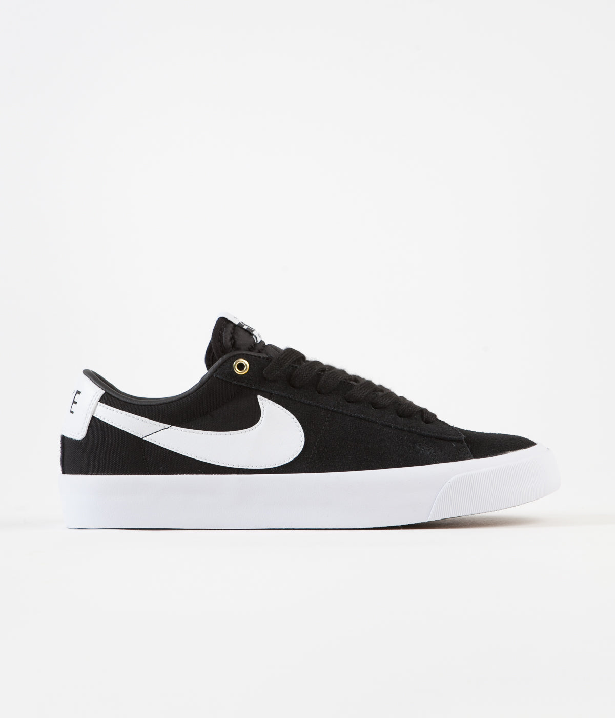 Nike black and on sale white striped shoes