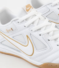 Nike sb gato gold best sale