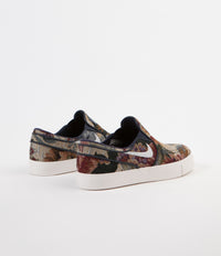 Nike janoski slip hot sale on canvas