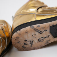 Nike SB x Humidity 'Trumpet' Dunk High QS Shoes - Metallic Gold / Metallic Gold - Black thumbnail