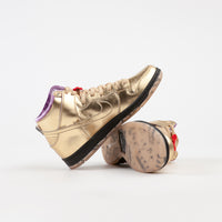 Nike SB x Humidity 'Trumpet' Dunk High QS Shoes - Metallic Gold / Metallic Gold - Black thumbnail